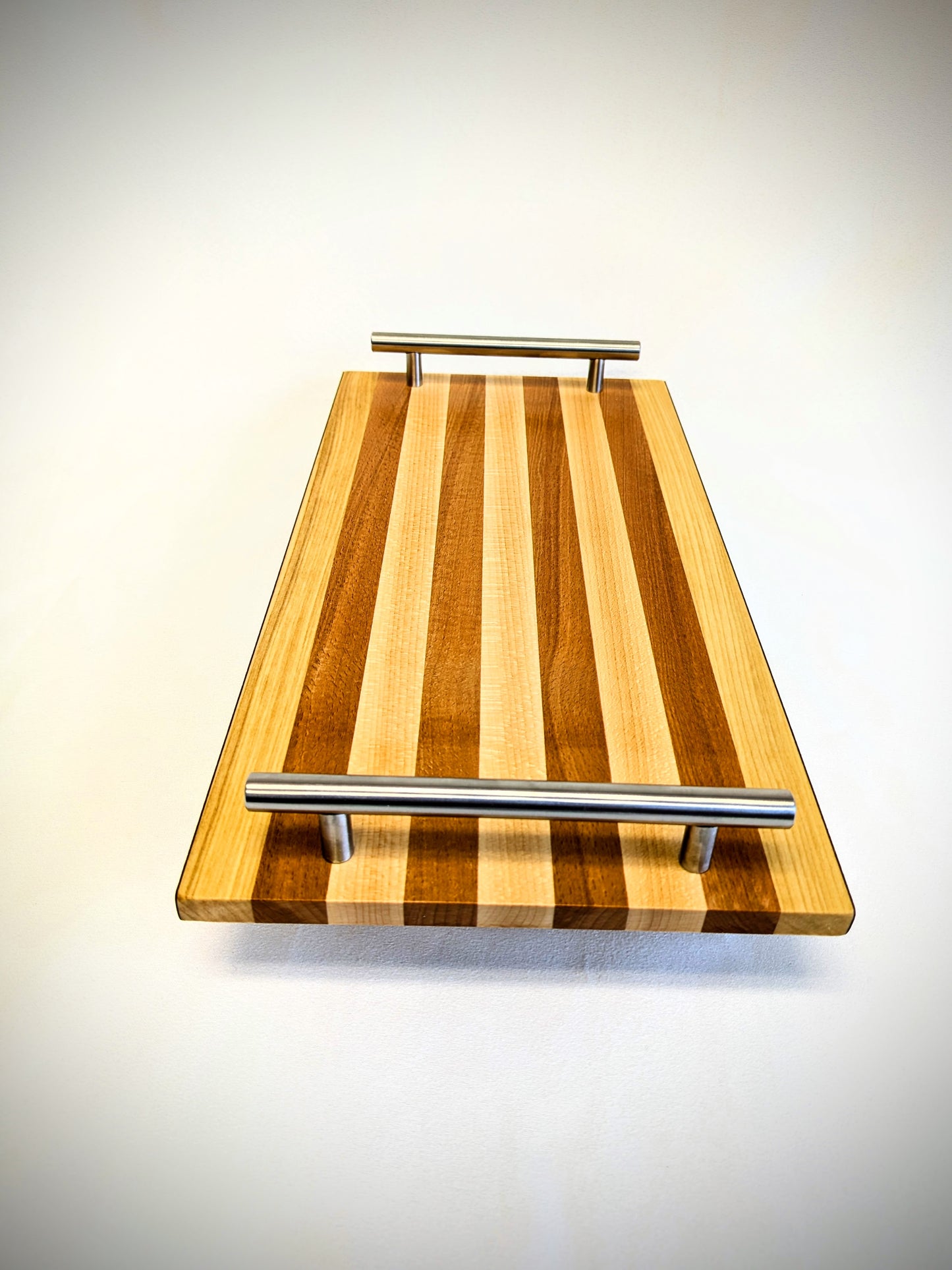 Experience the natural beauty and lasting durability of our handcrafted solid wood serving tray.