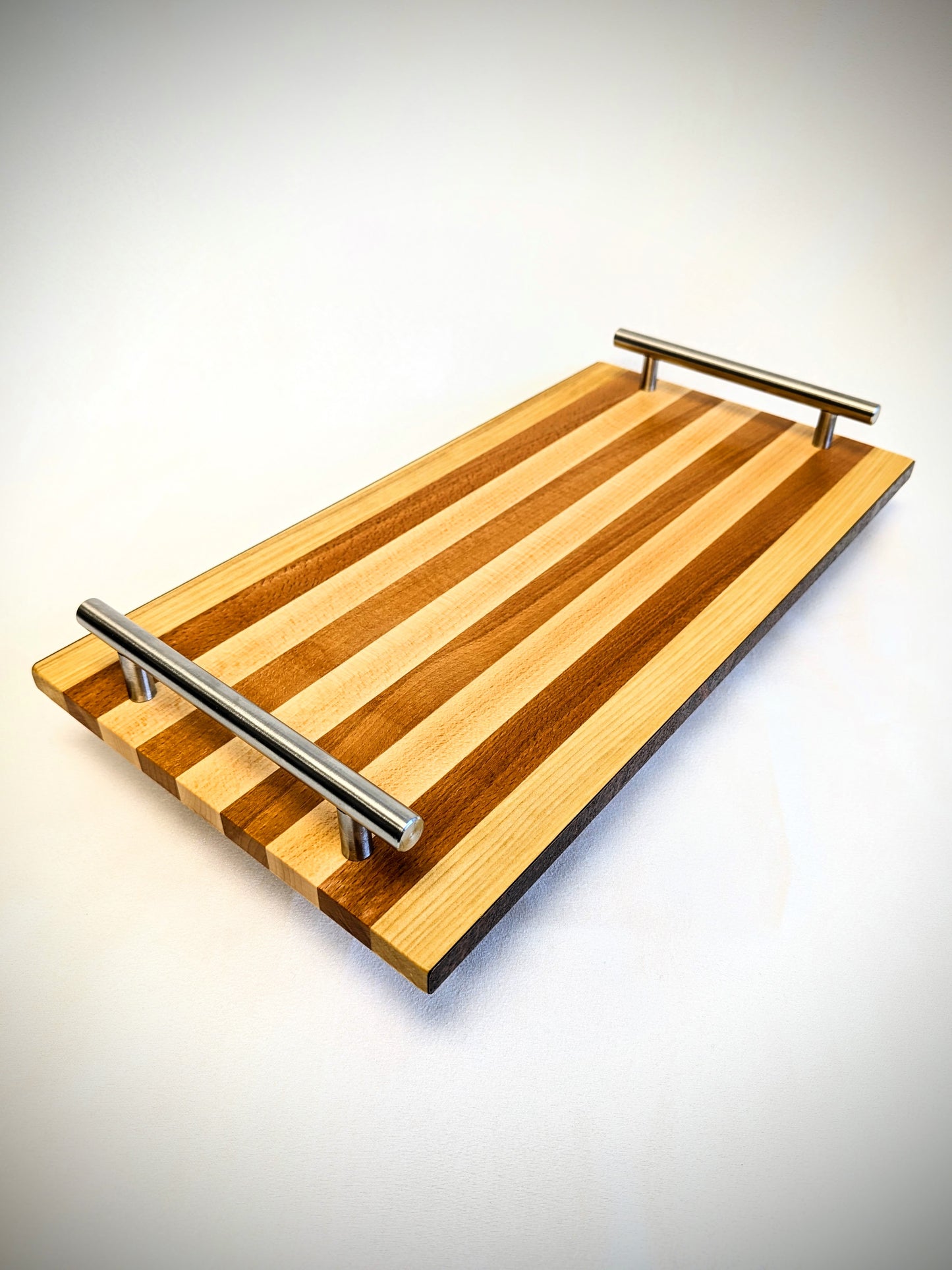 Experience the natural beauty and lasting durability of our handcrafted solid wood serving tray.